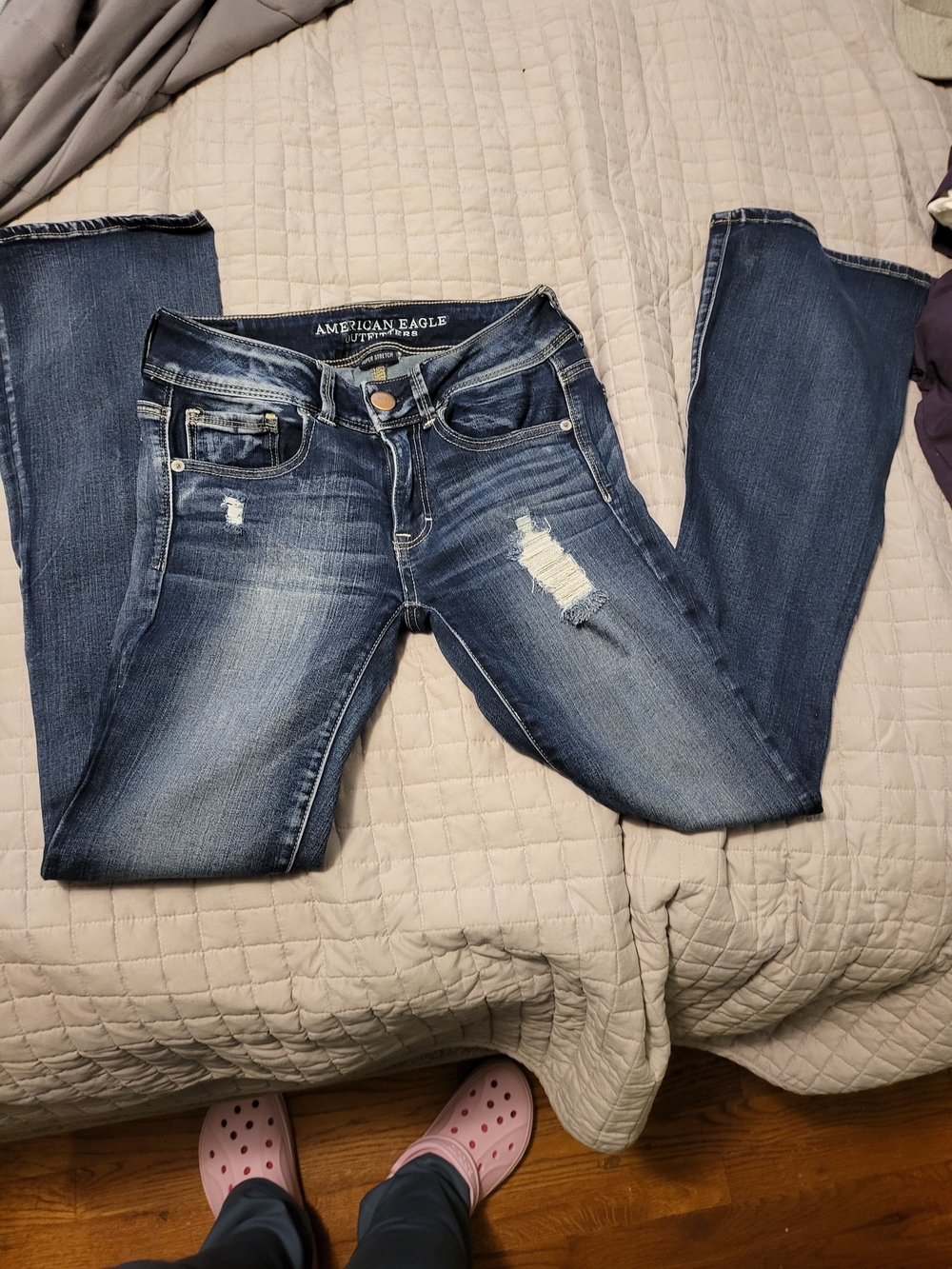 American Eagle Outfitters Women’s Distressed, Super Stretch, Mid-Rise Blue Jeans